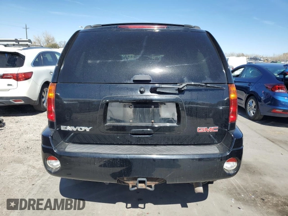 2005 GMC Envoy SLE z VIN 1GKDT13S752390266, wystawiony jako Copart lot #50766935 z przebiegiem 115 225 mil mil oraz Szkoda całkowita • Salvage title. Historia ofert i sprzedaży dostępna na DreamBid. Obrazek 6.