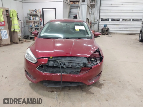 2015 Ford Focus SE with VIN 1FADP3F21FL270827, listed as a IAAI auction lot 42665015 with 162,745 mi miles and . Bid and sale history available at DreamBid. Image 13.