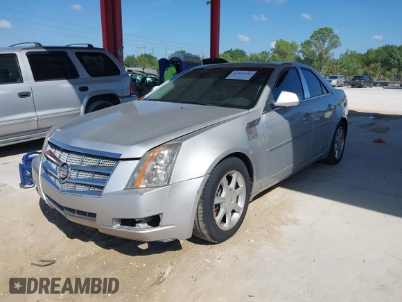 2009 Cadillac CTS AWD w/1SB with VIN 1G6DS57V190159989, listed as a IAAI auction lot 41897485 with 115,439 mi miles. Bid and sale history available at carsss.com. Image 2.