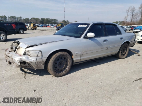 2003 Ford Police Interceptor Street Appear with VIN 2FAFP71WX3X110275, listed as a Copart auction lot 44157665 with 275,661 mi miles and Salvage title. Bid and sale history available at DreamBid. Image 1.