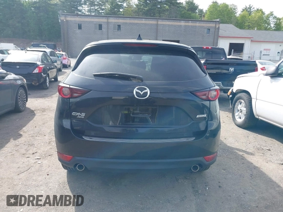 2018 Mazda CX-5 Touring z VIN JM3KFBCM9J0358997, wystawiony jako IAAI lot #42332606 z przebiegiem 93 952 mil mil oraz . Historia ofert i sprzedaży dostępna na DreamBid. Obrazek 16.