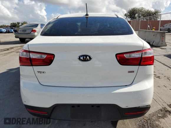 2014 Kia Rio LX with VIN KNADM4A35E6346018, listed as a Copart auction lot 85544104 with 76,455 mi miles and Salvage Title. Bid and sale history available at carsss.com. Image 6.