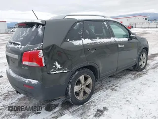 2012 Kia Sorento EX with VIN 5XYKUDA2XCG200628, listed as a IAAI auction lot 41495625 with 207,229 mi miles. Bid and sale history available at carsss.com. Image 4.