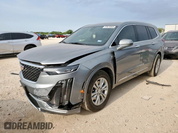 2024 Cadillac XT6 FWD Luxury with VIN 1GYKPAR41RZ700452, listed as a Copart auction lot 57675945 with 27,449 mi miles and Salvage title. Bid and sale history available at DreamBid. Image 1.