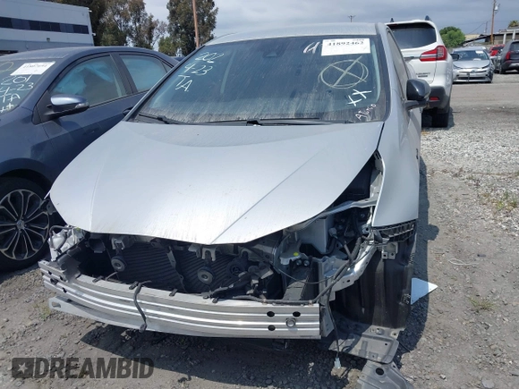2022 Toyota Prius L Eco with VIN JTDKAMFU8N3164240, listed as a IAAI auction lot 41892462 with 35,980 mi miles and . Bid and sale history available at DreamBid. Image 13.