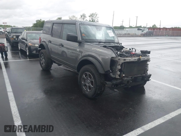 2022 Ford Bronco with VIN 1FMDE5BH5NLB12538, listed as a IAAI auction lot 42161313 with 64,518 mi miles and . Bid and sale history available at DreamBid. Image 1.