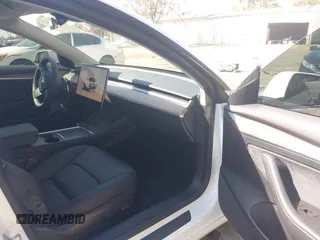 2022 Tesla Model 3 Long Range z VIN 5YJ3E1EB8NF212930, wystawiony jako IAAI lot #41658127 z przebiegiem 43 773 mil mil oraz . Historia ofert i sprzedaży dostępna na DreamBid. Obrazek 5.