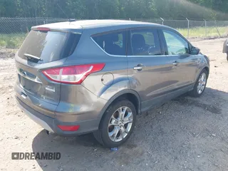 2013 Ford Escape SEL with VIN 1FMCU0H9XDUA14051, listed as a IAAI auction lot 42171703 with 193,988 mi miles. Bid and sale history available at carsss.com. Image 4.