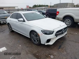 2021 Mercedes-Benz E-Class E 350 with VIN W1KZF8DB8MA897753, listed as a IAAI auction lot 41335129 with 76,873 mi miles. Bid and sale history available at carsss.com. Image 1.