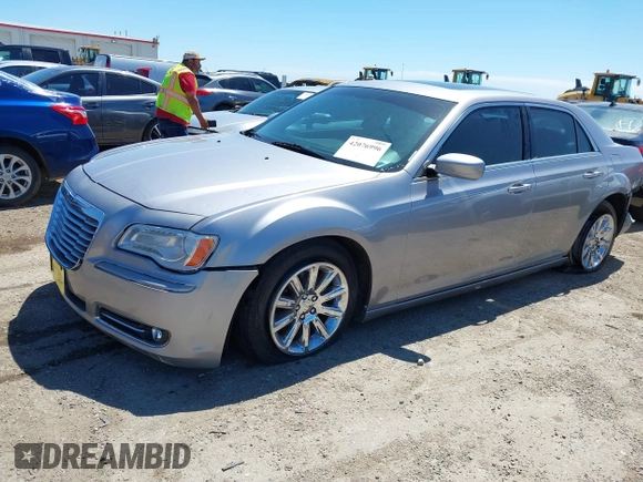 2014 Chrysler 300 with VIN 2C3CCAAG8EH264595, listed as a IAAI auction lot 42076996 with 101,659 mi miles and . Bid and sale history available at DreamBid. Image 2.