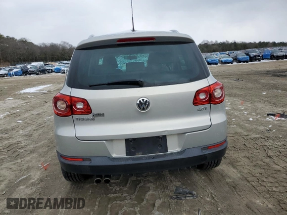 2010 Volkswagen Tiguan with VIN WVGAV9AX7AW514556, listed as a Copart auction lot 45373655 with 94,751 mi miles and Salvage Title. Bid and sale history available at DreamBid. Image 6.
