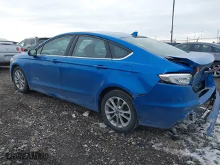 2019 Ford Fusion Hybrid SE with VIN 3FA6P0LUXKR131563, listed as a IAAI auction lot 41448736 with 165,440 mi miles. Bid and sale history available at carsss.com. Image 3.