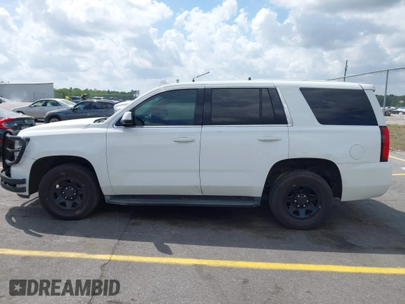 2016 Chevrolet Tahoe Commercial with VIN 1GNLCDEC5GR423300, listed as a IAAI auction lot 41967399 with 147,429 mi miles and . Bid and sale history available at DreamBid. Image 14.