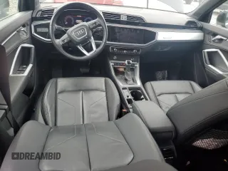 2020 Audi Q3 Premium with VIN WA1AECF35L1088335, listed as a Copart auction lot 65602815 with 53,926 mi miles and Salvage title. Bid and sale history available at DreamBid. Image 8.