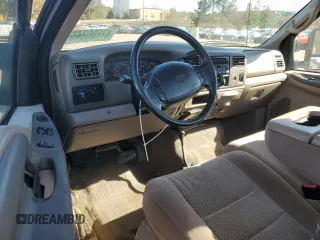 2002 Ford F-250 XL with VIN 1FTNF21L02EA83007, listed as a Copart auction lot 87880345 with 104,889 mi miles and Salvage title. Bid and sale history available at DreamBid. Image 8.