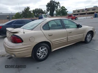 2002 Pontiac Grand Am SE1 z VIN 1G2NF52E52C183797, wystawiony jako IAAI lot #42328407 z przebiegiem Nie podano mil oraz . Historia ofert i sprzedaży dostępna na DreamBid. Obrazek 4.