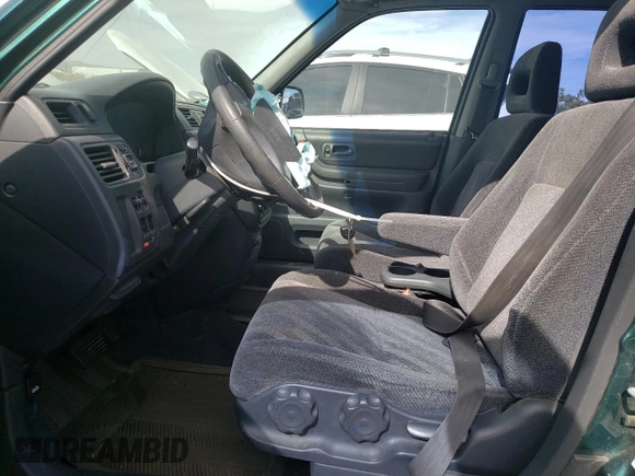 1999 Honda CR-V LX with VIN JHLRD1847XC036630, listed as a Copart auction lot 75708664 with 201,240 mi miles and Salvage Title. Bid and sale history available at carsss.com. Image 7.