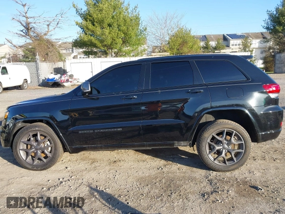 2021 Jeep Grand Cherokee Limited z VIN 1C4RJFBG8MC536748, wystawiony jako IAAI lot #41820268 z przebiegiem 49 882 mil mil oraz . Historia ofert i sprzedaży dostępna na DreamBid. Obrazek 14.