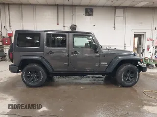 2018 Jeep Wrangler JK Unlimited Sport S with VIN 1C4BJWDGXJL889020, listed as a IAAI auction lot 41989203 with 60,170 mi miles. Bid and sale history available at carsss.com. Image 13.