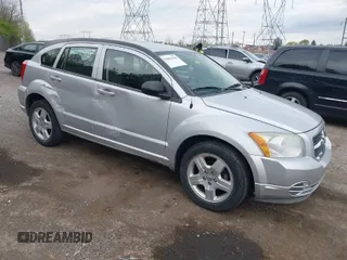 2009 Dodge Caliber SXT with VIN 1B3HB48A69D104307, listed as a IAAI auction lot 42002198 with 139,442 mi miles and . Bid and sale history available at carsss.com. Image 1.