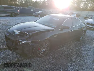 2017 Maserati Ghibli with VIN ZAM57XSL9H1235645, listed as a Copart auction lot 84712364 with 82,489 mi miles and Salvage Title. Bid and sale history available at carsss.com. Image 1.