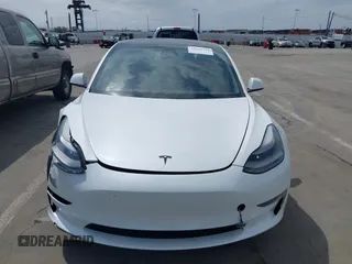 2021 Tesla Model 3 Performance with VIN 5YJ3E1EC2MF084594, listed as a IAAI auction lot 42030339 with 43,215 mi miles and . Bid and sale history available at DreamBid. Image 12.