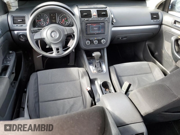 2010 Volkswagen Jetta S with VIN 3VWJX7AJ1AM026800, listed as a Copart auction lot 55755185 with 126,551 mi miles and Salvage title. Bid and sale history available at DreamBid. Image 8.