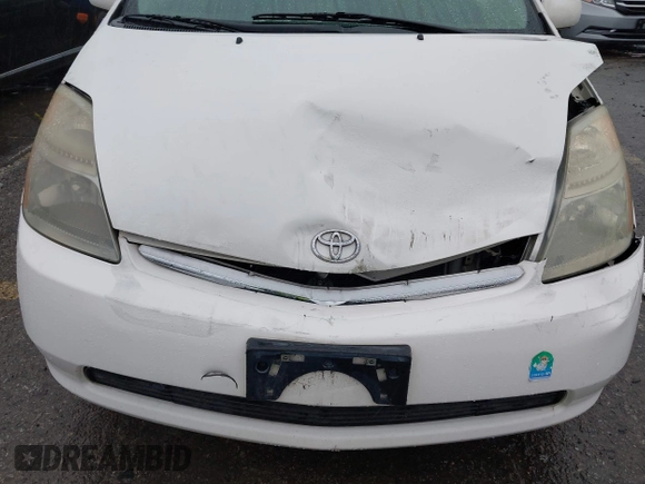2007 Toyota Prius z VIN JTDKB20U177622142, wystawiony jako IAAI lot #41720920 z przebiegiem 140 665 mil mil oraz . Historia ofert i sprzedaży dostępna na DreamBid. Obrazek 6.
