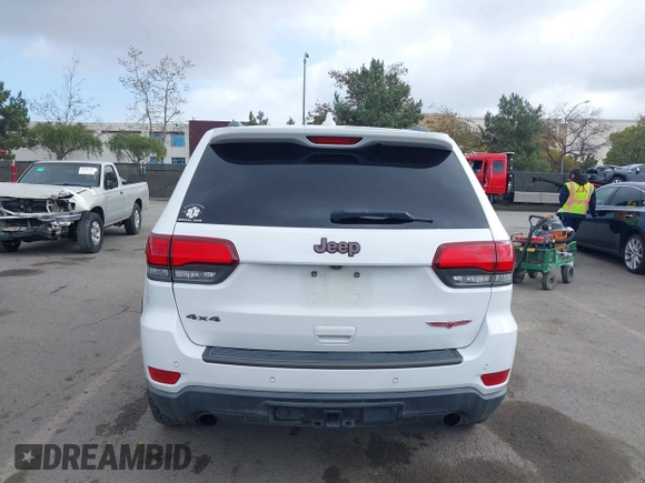 2018 Jeep Grand Cherokee Trailhawk with VIN 1C4RJFLT2JC137793, listed as a IAAI auction lot 41697299 with 149,100 mi miles and . Bid and sale history available at DreamBid. Image 16.