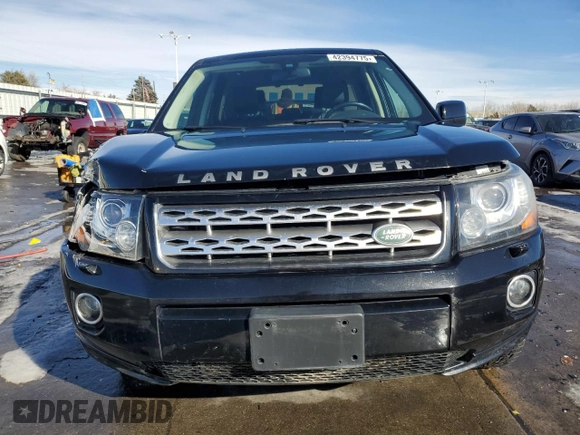 2014 Land Rover LR2 z VIN SALFR2BG7EH418479, wystawiony jako Copart lot #42394775 z przebiegiem 74 247 mil mil oraz Szkoda całkowita • Salvage title. Historia ofert i sprzedaży dostępna na DreamBid. Obrazek 5.