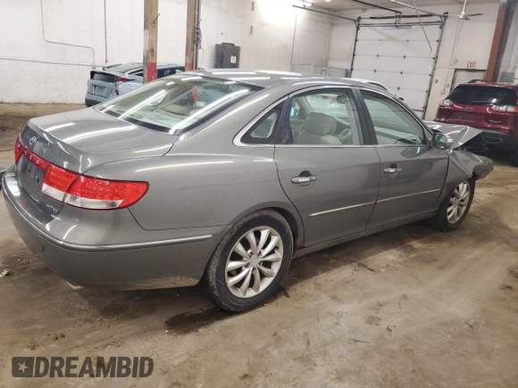 2007 Hyundai Azera SE z VIN KMHFC46FX7A183539, wystawiony jako Copart lot #54205265 z przebiegiem 154 942 mil mil oraz Nie do naprawy • Non repairable. Historia ofert i sprzedaży dostępna na DreamBid. Obrazek 3.