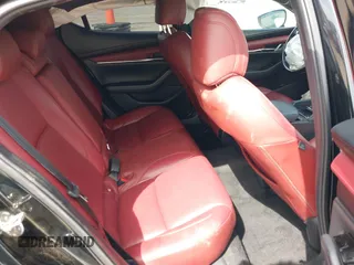 2021 Mazda 3 Premium Plus z VIN JM1BPBNY2M1403797, wystawiony jako IAAI lot #42031637 z przebiegiem Nie podano mil oraz . Historia ofert i sprzedaży dostępna na DreamBid. Obrazek 8.