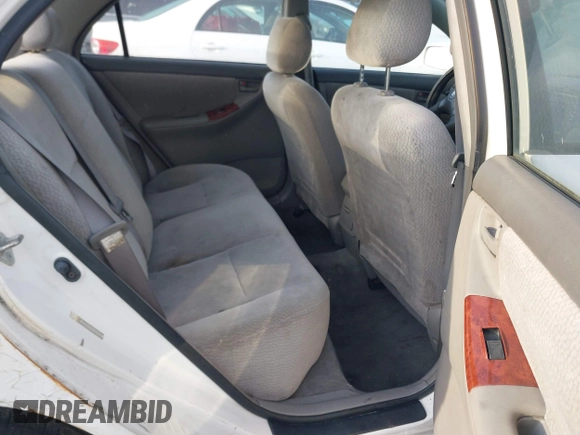 2004 Toyota Corolla CE with VIN JTDBR32E042025208, listed as a IAAI auction lot 41934485 with 299,999 mi miles. Bid and sale history available at carsss.com. Image 8.