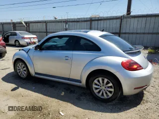 2016 Volkswagen Beetle with VIN 3VWF07AT9GM619860, listed as a Copart auction lot 56357605 with 67,212 mi miles and Salvage Title. Bid and sale history available at DreamBid. Image 2.