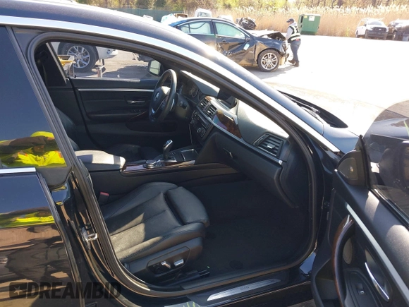 2016 BMW 4 Series 428i xDrive with VIN WBA4C9C53GG135945, listed as a IAAI auction lot 41964691 with 93,273 mi miles and . Bid and sale history available at carsss.com. Image 5.