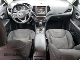 2015 Jeep Cherokee Latitude with VIN 1C4PJLCB9FW706934, listed as a Copart auction lot 52696105 with 125,205 mi miles and Salvage Title. Bid and sale history available at DreamBid. Image 8.
