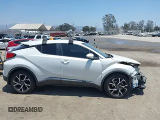 2018 Toyota C-HR XLE with VIN NMTKHMBX8JR036857, listed as a IAAI auction lot 42667018 with 63,058 mi miles and . Bid and sale history available at DreamBid. Image 14.