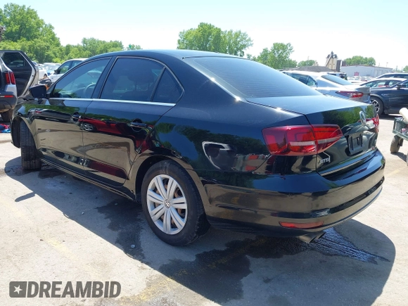 2017 Volkswagen Jetta S with VIN 3VW2B7AJ1HM329900, listed as a IAAI auction lot 42213125 with 124,556 mi miles and . Bid and sale history available at DreamBid. Image 3.