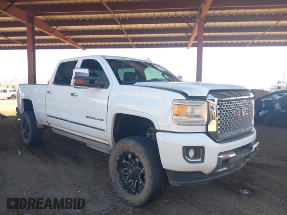 2016 GMC Sierra 2500HD Denali z VIN 1GT12UE85GF157972, wystawiony jako IAAI lot #40659216 z przebiegiem 130 351 mil mil oraz . Historia ofert i sprzedaży dostępna na DreamBid. Obrazek 1.