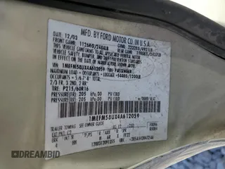 2004 Mercury Sable z VIN 1MEFM58UX4A612059, wystawiony jako Copart lot #77181894 z przebiegiem Nie podano mil oraz Czysty tytuł • Clean title. Historia ofert i sprzedaży dostępna na DreamBid. Obrazek 13.