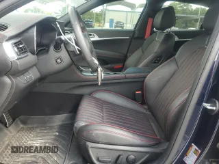 2023 Genesis G70 2.0T with VIN KMTG34TA8PU127827, listed as a Copart auction lot 59662305 with 6,310 mi miles and Salvage title. Bid and sale history available at DreamBid. Image 7.