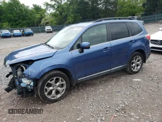 2018 Subaru Forester Touring z VIN JF2SJAWC8JH496814, wystawiony jako Copart lot #55171945 z przebiegiem 74 304 mil mil oraz Szkoda całkowita • Salvage title. Historia ofert i sprzedaży dostępna na DreamBid. Obrazek 1.
