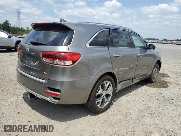 2016 Kia Sorento SX z VIN 5XYPKDA52GG141330, wystawiony jako Copart lot #55448425 z przebiegiem 78 330 mil mil oraz Szkoda całkowita • Salvage title. Historia ofert i sprzedaży dostępna na DreamBid. Obrazek 3.