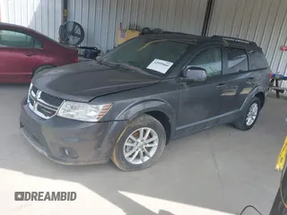 2014 Dodge Journey SXT with VIN 3C4PDCBB3ET144042, listed as a IAAI auction lot 42095860 with 154,847 mi miles. Bid and sale history available at carsss.com. Image 2.