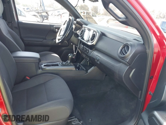 2018 Toyota Tacoma SR5 with VIN 3TMAZ5CN2JM067292, listed as a IAAI auction lot 41851959 with 70,988 mi miles and . Bid and sale history available at DreamBid. Image 5.