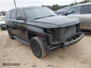 2018 Chevrolet Tahoe Commercial with VIN 1GNLCDEC3JR221708, listed as a IAAI auction lot 41157325 with 163,845 mi miles. Bid and sale history available at carsss.com. Image 1.
