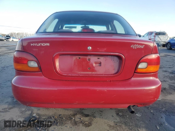1997 Hyundai Accent z VIN KMHVF24N9VU356190, wystawiony jako Copart lot #85610774 z przebiegiem 91 707 mil mil oraz Tytuł czysty. Historia ofert i sprzedaży dostępna na DreamBid. Obrazek 6.