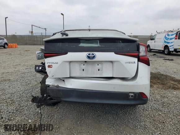 2021 Toyota Prius L Eco z VIN JTDKAMFU6M3140307, wystawiony jako Copart lot #58436795 z przebiegiem 53 151 mil mil oraz Szkoda całkowita • Salvage title. Historia ofert i sprzedaży dostępna na DreamBid. Obrazek 6.