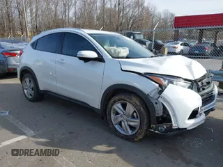 2019 Honda HR-V EX with VIN 3CZRU5H51KM726033, listed as a IAAI auction lot 41607041 with 73,220 mi miles. Bid and sale history available at carsss.com. Image 1.