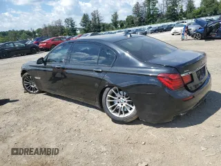 2015 BMW 7 Series 740Li xDrive with VIN WBAYF4C53FGS99173, listed as a Copart auction lot 64185443 with 80,230 mi miles. Bid and sale history available at carsss.com. Image 2.